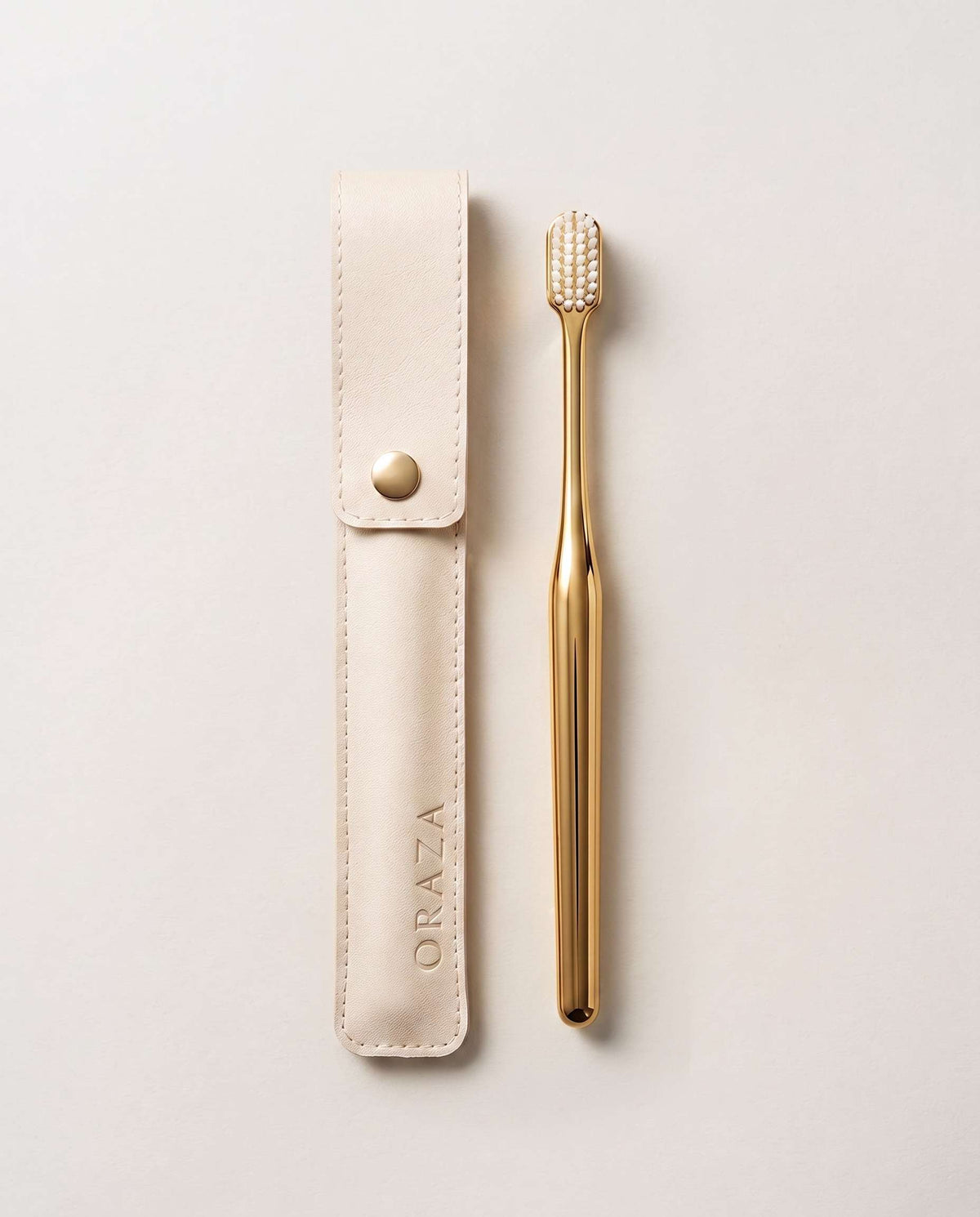 WHITE LEATHER CASE &  GOLD TOOTHBRUSH