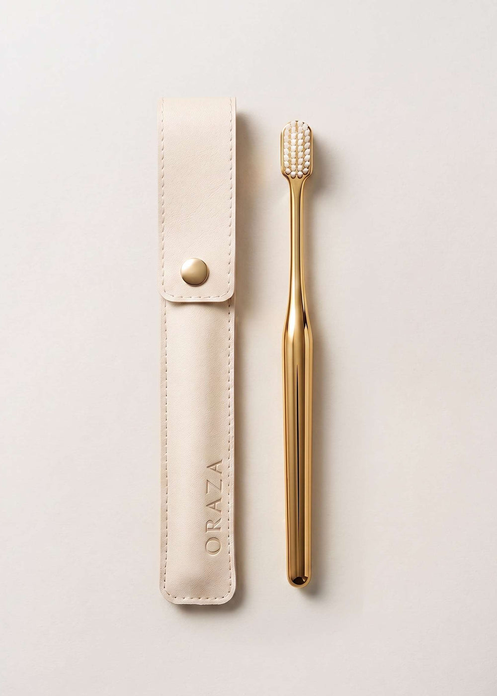 WHITE LEATHER CASE &  GOLD TOOTHBRUSH