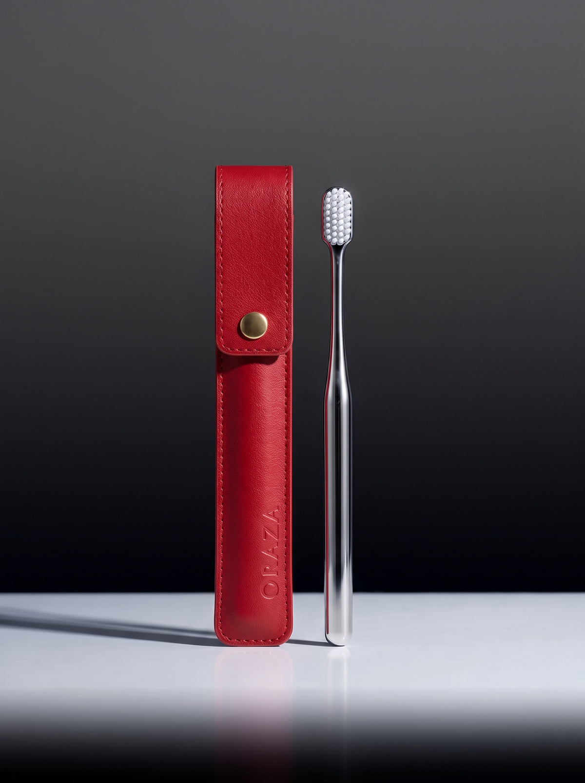 RED LEATHER CASE & SILVER TOOTHBRUSH