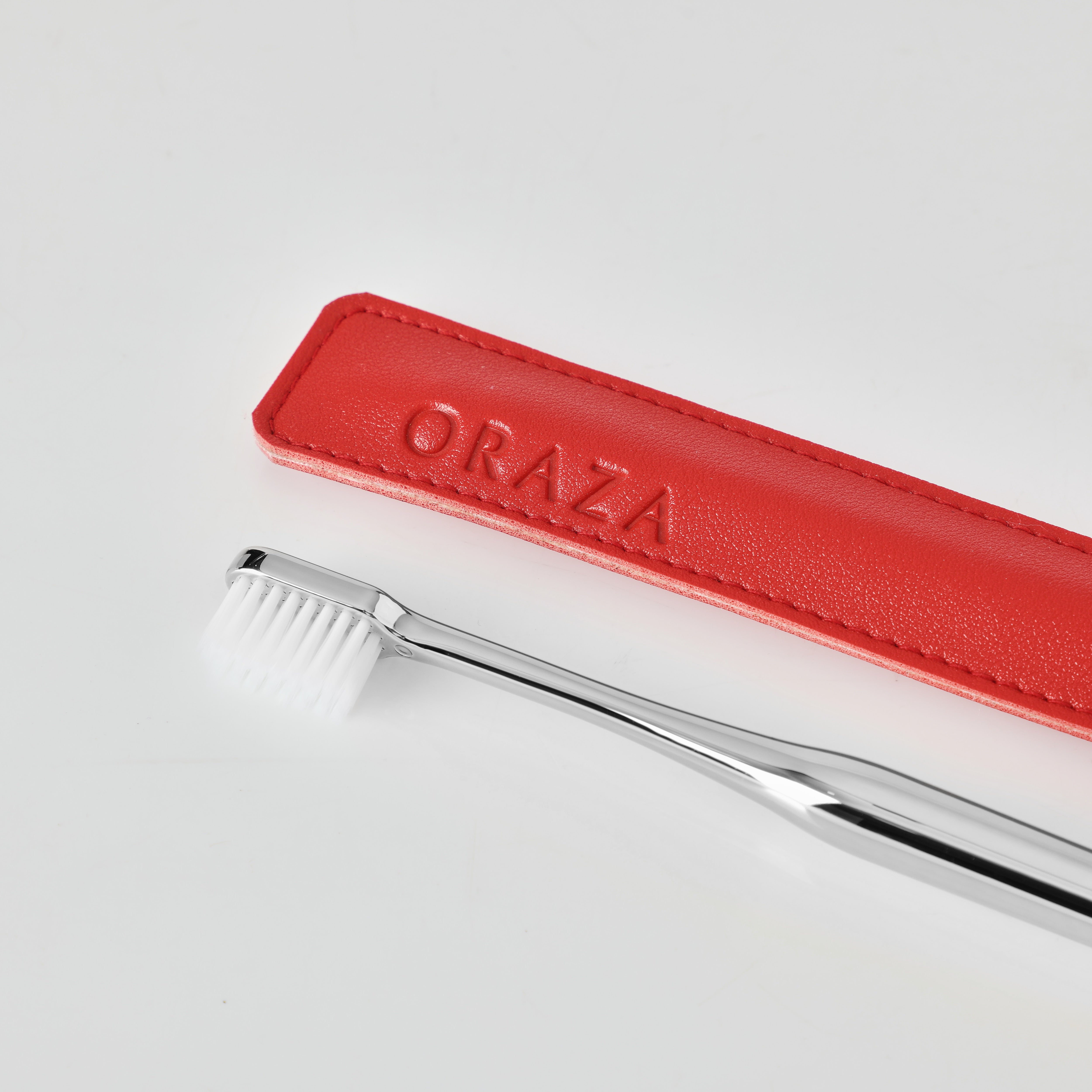 Red Leather Case & Silver Toothbrush