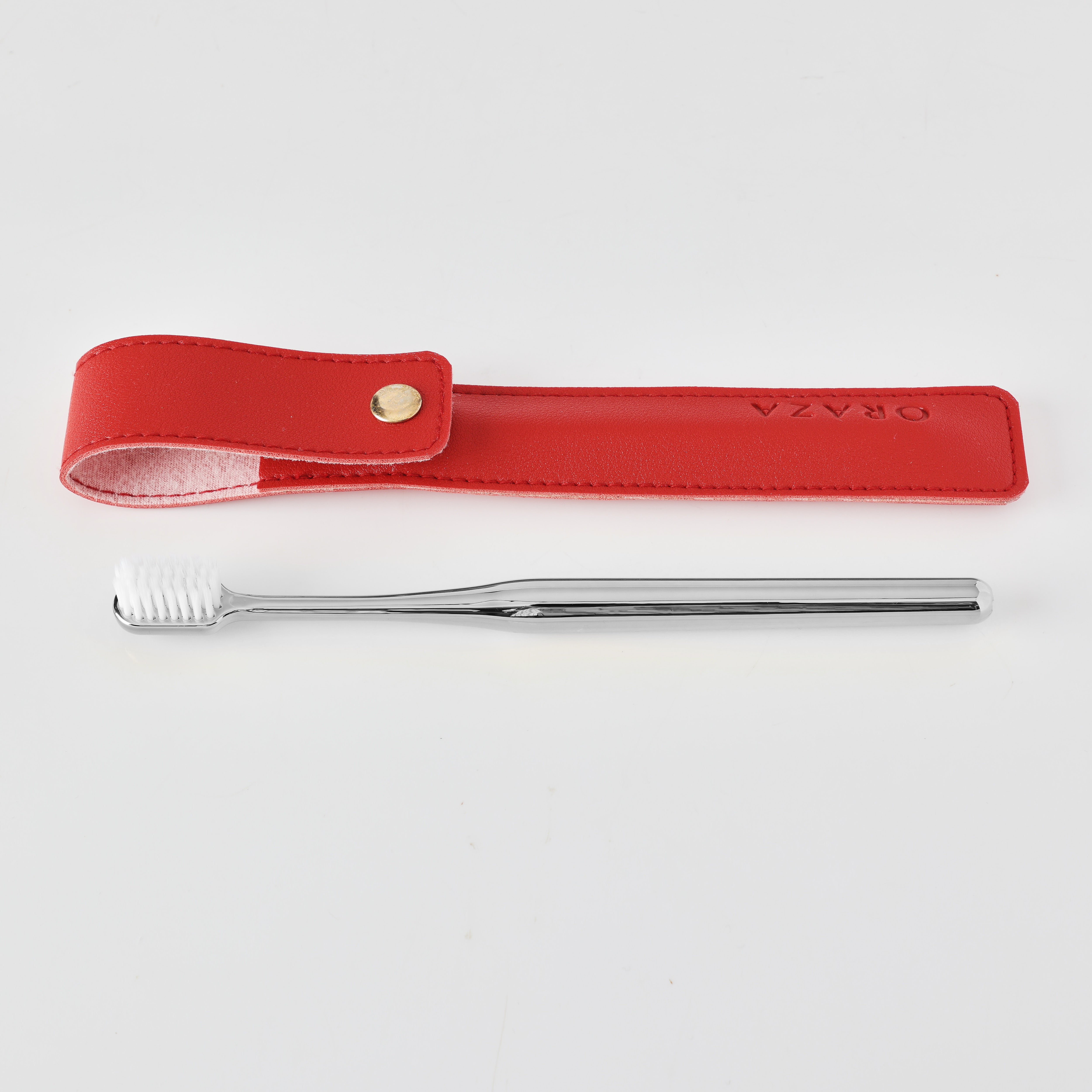 RED LEATHER CASE & SILVER TOOTHBRUSH