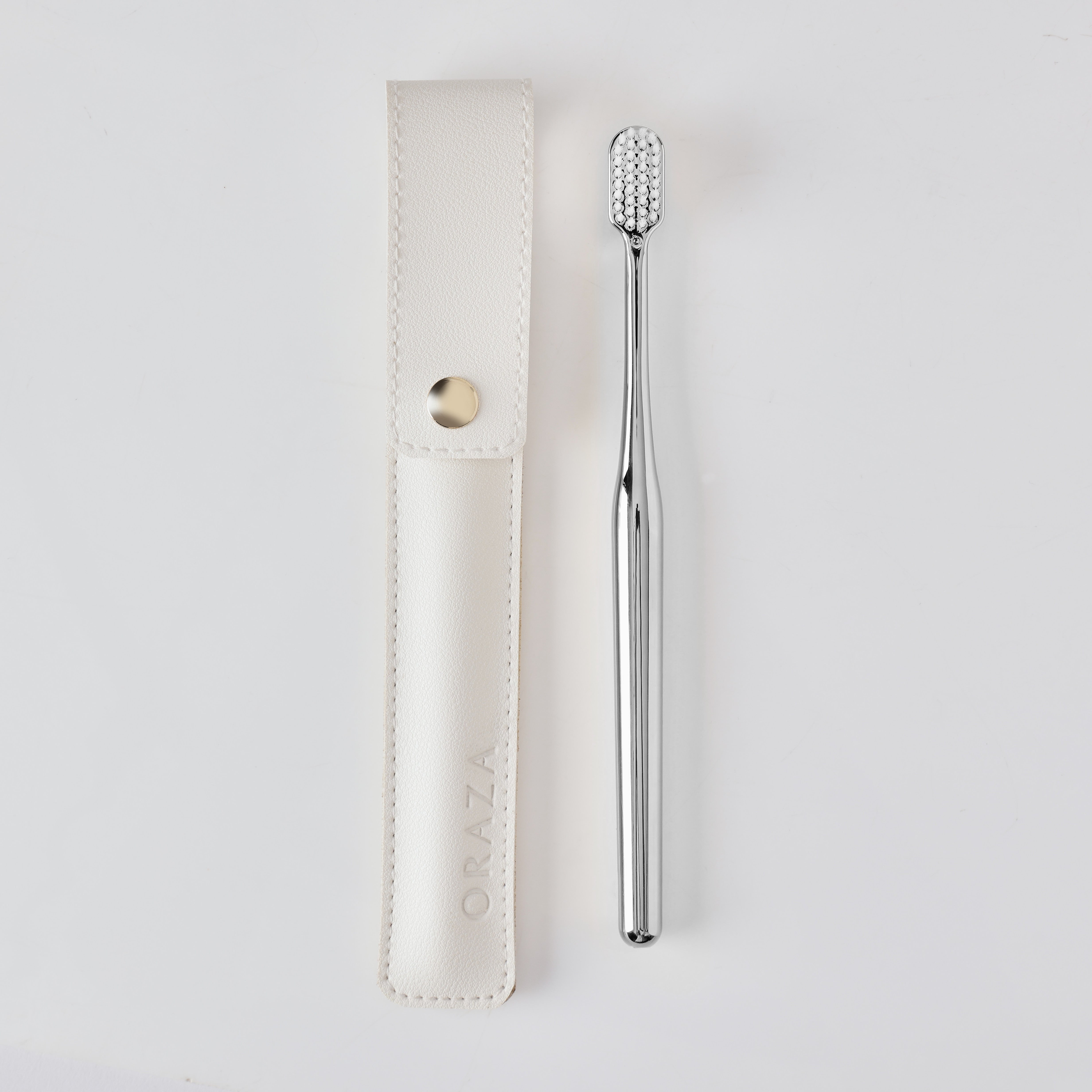 WHITE LEATHER CASE & SILVER TOOTHBRUSH