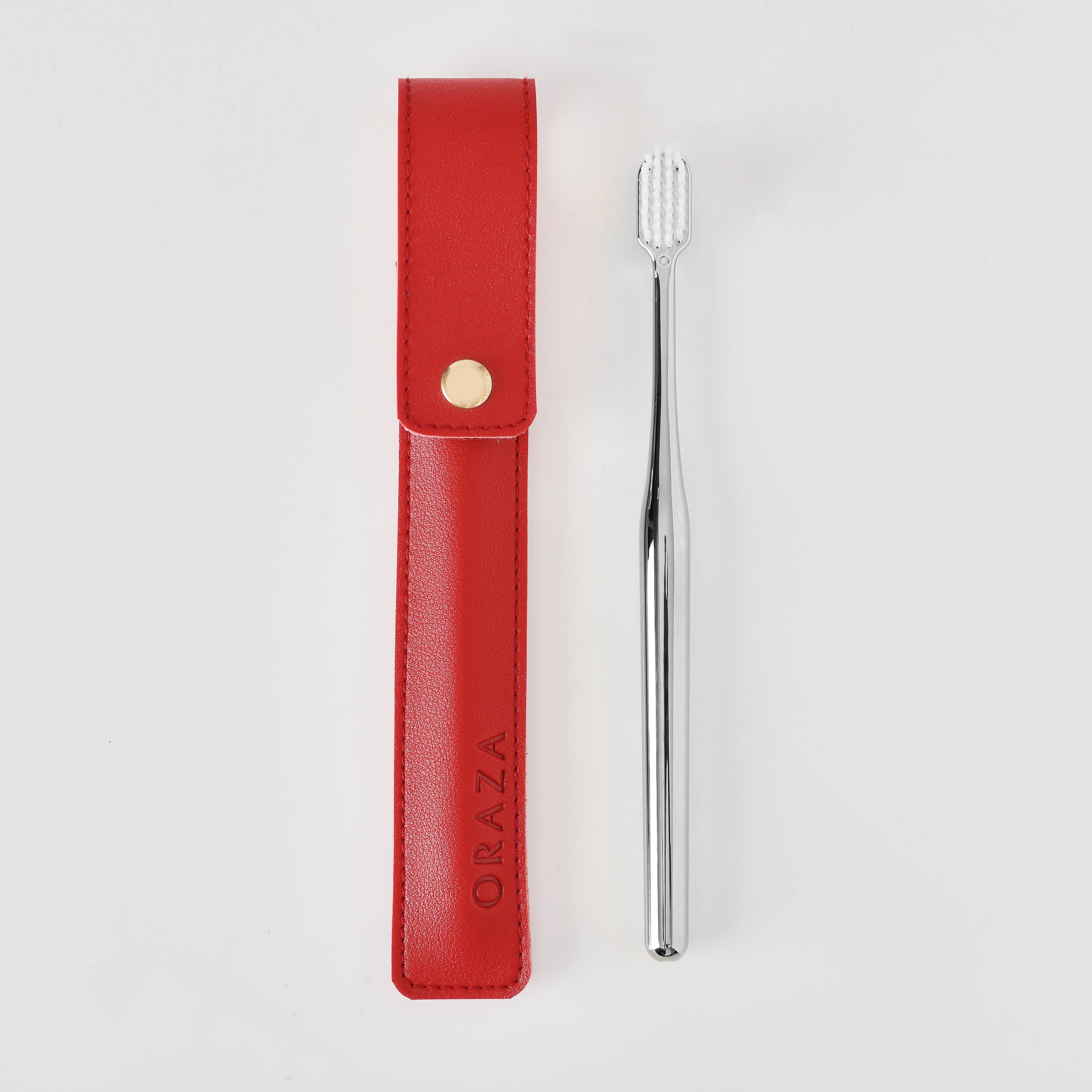 RED LEATHER CASE & SILVER TOOTHBRUSH