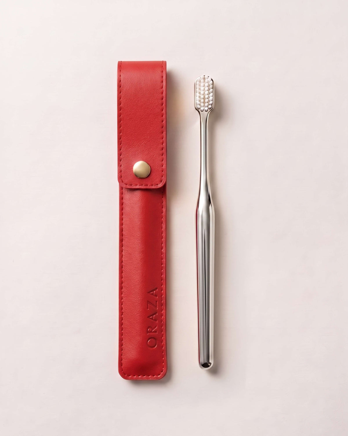 RED LEATHER CASE & SILVER TOOTHBRUSH